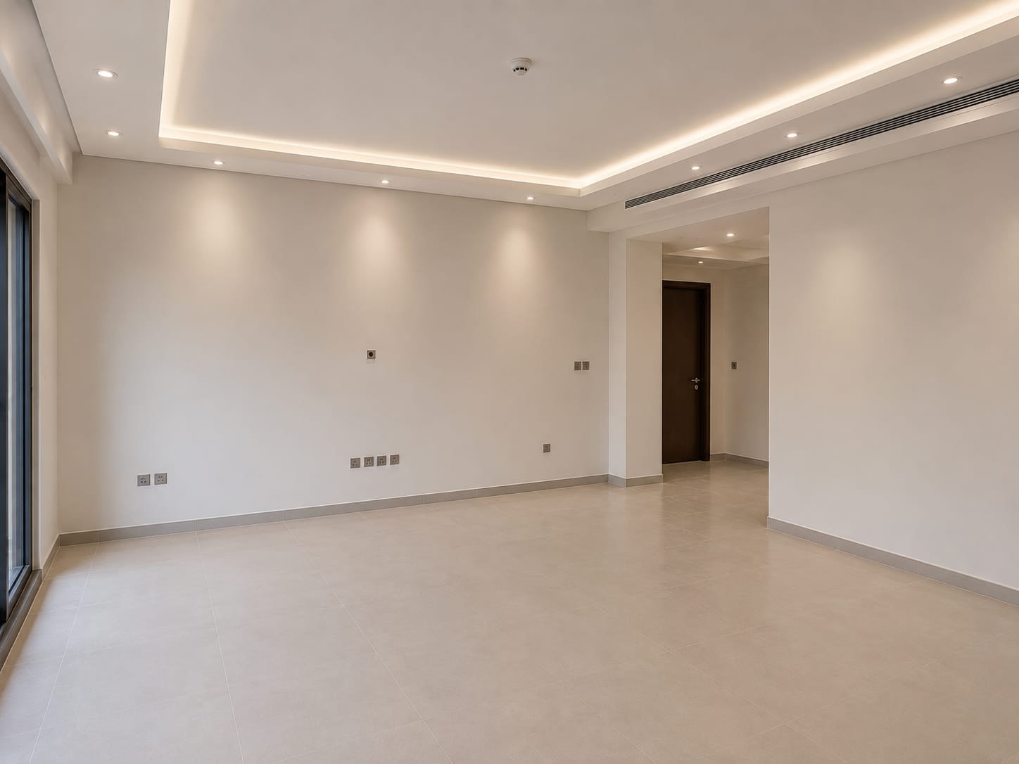 An Empty Shell Styled Into A Family Living Room. before renovation